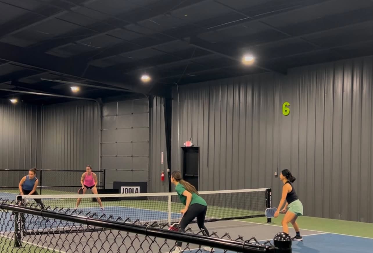 Kanza at the net, mid-point